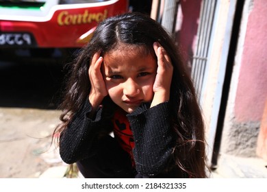 28 june 2019, Nepal , Young unidentified girl pose for pictures in the sunny day on roadside in Pokhara, Nepal