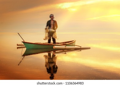 28 March 2018, Kudat, Sabah Malaysia : A Local Fisherman Ready To Cast Net.