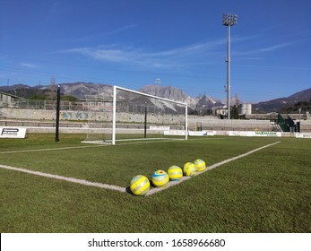 28/02/2020 Carrara Massa Carrara Italy . Football Stadium In A Small Provincial Town With The Apuan Alps In The Background

￼


