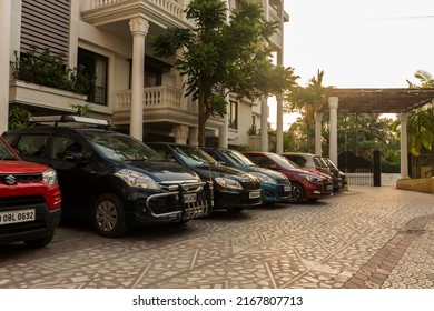 28th May, 2022, Diamond Harbour, West Bengal, India: Few cars parked at the parking lot of a hotel.