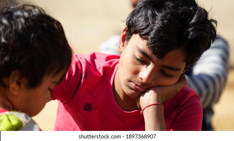 29 December 2020, Reengus Jaipur, India. Handsome Little Indian Boy View, Holding His Hand On Cheek And Sleeping With Closed Eyes.