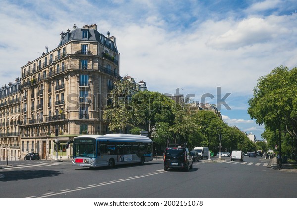 29 May 2021 -\
Paris, France: Cars and buses traveling on Boulevard de l\'Hôpital\
in 13th arrondissement of\
Paris