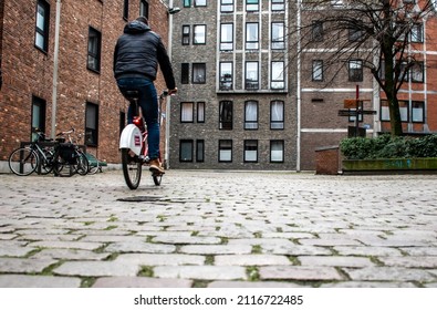 29.01.2022 Antwerp - A Man Circles On A Bicycle In Antwerp