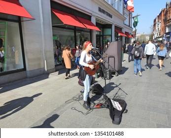 29th March 2019, Dublin, Ireland. Busker Performing On Grafton Street, Dublin City Centre. 