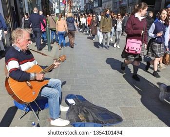 29th March 2019, Dublin, Ireland. Busker Performing On Grafton Street, Dublin City Centre. 