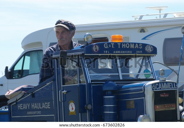 2nd July 2017- A man with a\
scaled down version of a Scammell lorry at a classic car show in\
Pembrey Country Park near Llanelli, Carmarthenshire, Wales,\
UK.