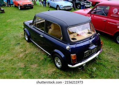 2nd May 2022- A stylish Austin Mini Clubman, customised two door saloon car, parked in the grounds at Carew Castle  in Carew,  Pembrokeshire, Wales, UK.