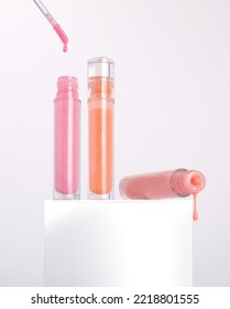 3 Color Dripping Lipgloss, Pink, Nude,  Orange Lipgloss On White Clear Background