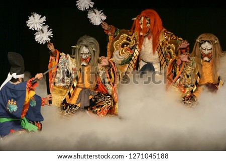3 demons engaging a samurai hero in the Kagura performance