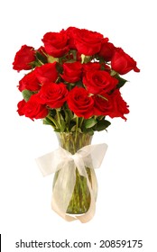 3 Dozen Red Roses In A Glass Vase And A White Bow Isolated