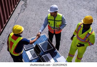 3 engineer working in clean solar energy industry talking about the design engineer of solar panel