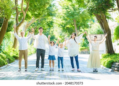 3 Generation Family Holding Hands           