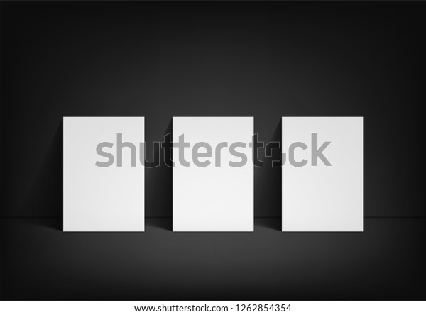 3 Poster Mockup On Black Background Stock Photo Edit Now