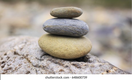 3 Rocks On A Big Rock