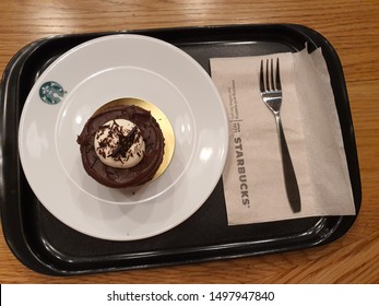 3 Sep 2019; Bangkok Thailand: Top View Of Dish Of Starbucks Chocolate Cake At Starbucks Cafe Coffee Shop