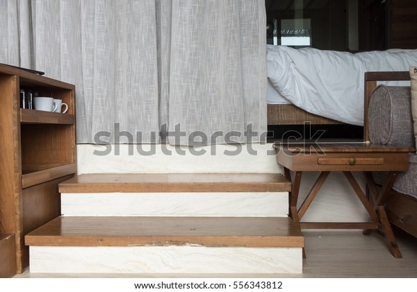 3 steps of stair divided living room and\
bedroom in apartment