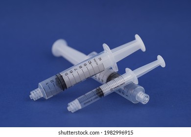 3 Syringe With Blue Back Drop 