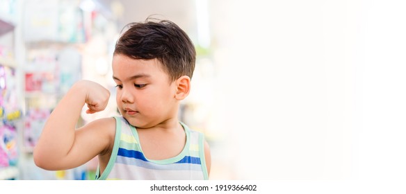 3 Years Old Mixed Race Child Asian Caucasian Boy With Strong Look Healthy.childhood Kindergarten Kid With Strong Muscle And Good Emotion.Happy Kid In Grocery Store.Pediatric, Vaccine, Protect Virus.