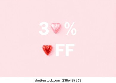 30 percent off sale banner. Heart shaped candies on pink background.  - Powered by Shutterstock