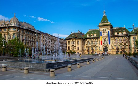 30.04.2021 Craiova, Romania. Photography of the fountain in the Mihai Viteazu Square and Craiova city Hall in the back.