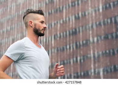 30-35 Year Old Caucasian Male Jogging In The Park