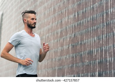 30-35 Year Old Caucasian Male Jogging In The Park