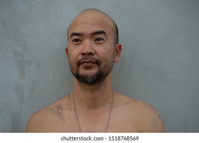 30-40s Beard Bald Japanese Topless Happy Cool Man Portrait On Grey Concrete Wall Background