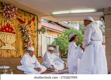 30-Mar-2008-prist Tying Kasti-The Parsi Navjote Religious Ceremony; Mumbai Bombay; Maharashtra; India