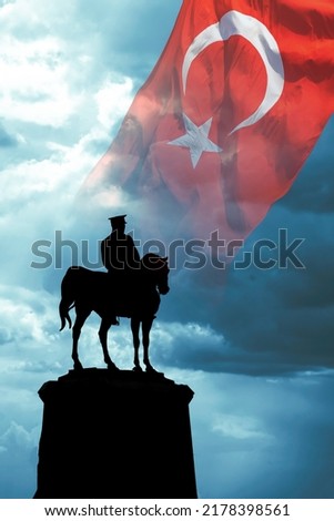 30th august victory day of Turkey or 30 agustos zafer bayrami background vertical photo. Silhouette of the statue of Mustafa Kemal Ataturk and Turkish flag.