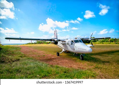 31 August 2016 Ambrym Airport Vanuatu Island, A Classic Vintage Propeller Plane From Vanuatu Airline Just Arrived At The Grass Runway Parking.