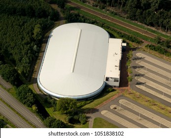 31 July 2017, Enschede, Holland. Aerial View Of Skatehall IJSBAAN ENSCHEDE In Twente. It Is A Modern White Stadium With An Empty Parking Lot.