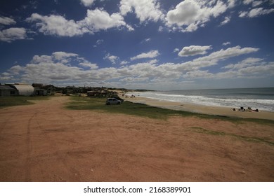 3-10-2013: Punta Del Diablo, Uruguay: People And Buildings On The Beach At Punta Del Diablo