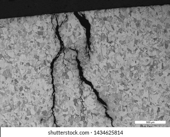 316 stainless steel coupon removed from a thermowell boss that failed due to chlorde stress corrosion cracking. Fractography and metallography.