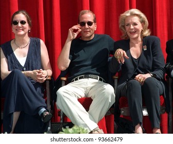 31JUL97:  Actress LAUREN BACALL (right) with children STEPHEN & LESLIE BOGART at unveilling ceremony in Hollywood for new US postage stamp honoring actor Humphrey Bogart.