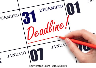31st Day Of December. Hand Drawing Red Line And Writing The Text Deadline On Calendar Date December 31. Deadline Word Written On Calendar Winter Month, Day Of The Year Concept.