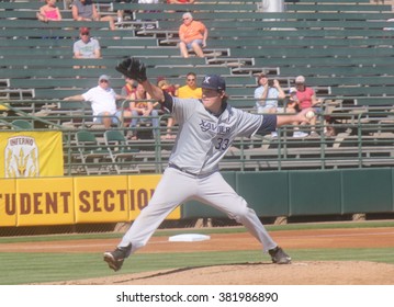 #33 Trent Astle Lift Hand Pitcher For Xavier University At Phoenix Municipal Stadium In Phoenix AZ USA 2-21-16. Case # 02701497