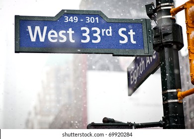 33rd Street Direction Sign In New York In Blizzard