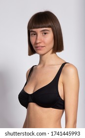 3/4 Portrait Of Sweet Girl In Black Bra And Short Hairstyle Isolated On White, Model Polaroids