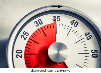 35 Minutes - Analog Kitchen Timer With Red Mark Placed On A Fridge In Monochrome Colors - Shutterstock ID 1138968497