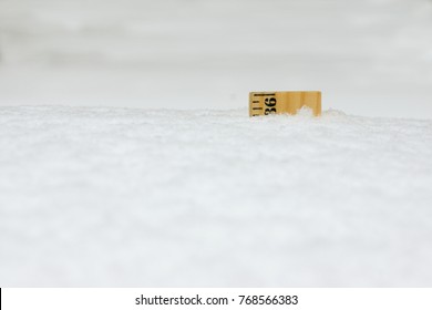 A 36 Inch Yard Stick Buried In Snow After A Blizzard.