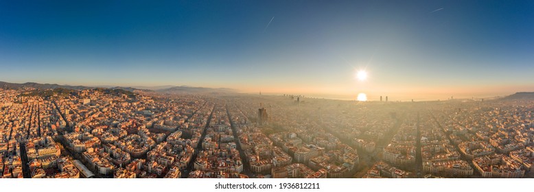 360 Aerial Panorama Drone Shot Of Skyline In Barcelona City Center In Foggy Sunrise Golden Hour In Spain Winter