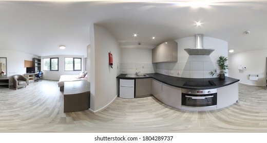 360 Degree Full Sphere Panoramic photo of a modern newly built house interior kitchen showing new kitchen appliances.