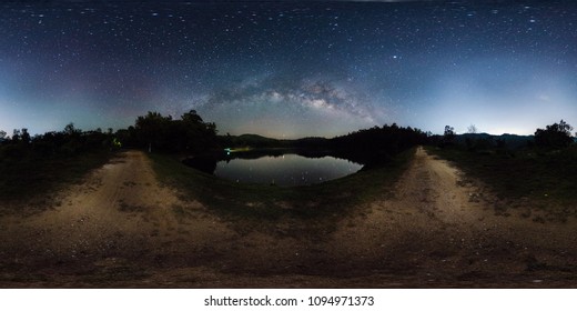 360 Degree Panorama Of Dark Sky, Star And Milky Way Band Across Sky Over Reservoir.