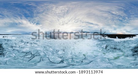 360 degree panorama of White sea covered with ice. Huge ice floes cover the water. Beautiful clean arctic ice. Frozen North Sea. Aerial 360 panorama