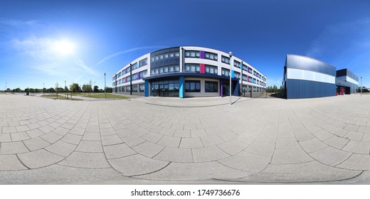 360 degree panoramic sphere photo of the Whitcliffe Mount Primary School showing the entrance to the British school on a sunny summers day