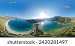 360 degree panoramic view of the lagoon in Oludeniz where paragliders fly. A popular tourist resort for extreme sports enthusiasts in Turkey. Aerial seamless spherical panorama