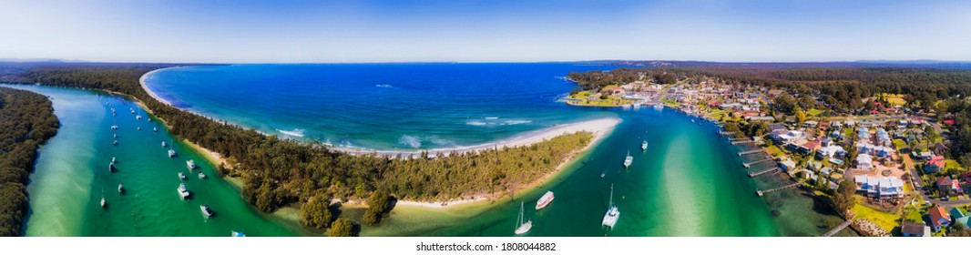 360 degrees aerial panorama over Huskisson town waterfront on Jervis bay with Curambene creek delta.