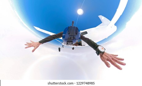 360 Dregree Selfie Photo Of Skydiver Above The Clouds With Camera Attached On The Helmet