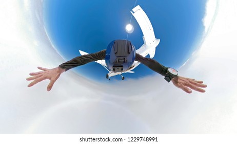 360 Dregree Selfie Photo Of Skydiver Above The Clouds With Camera Attached On The Helmet