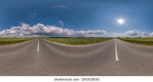 360 seamless hdri panorama view on asphalt road among fields in summer day with awesome clouds in blue sky in equirectangular spherical projection, ready AR VR virtual reality content